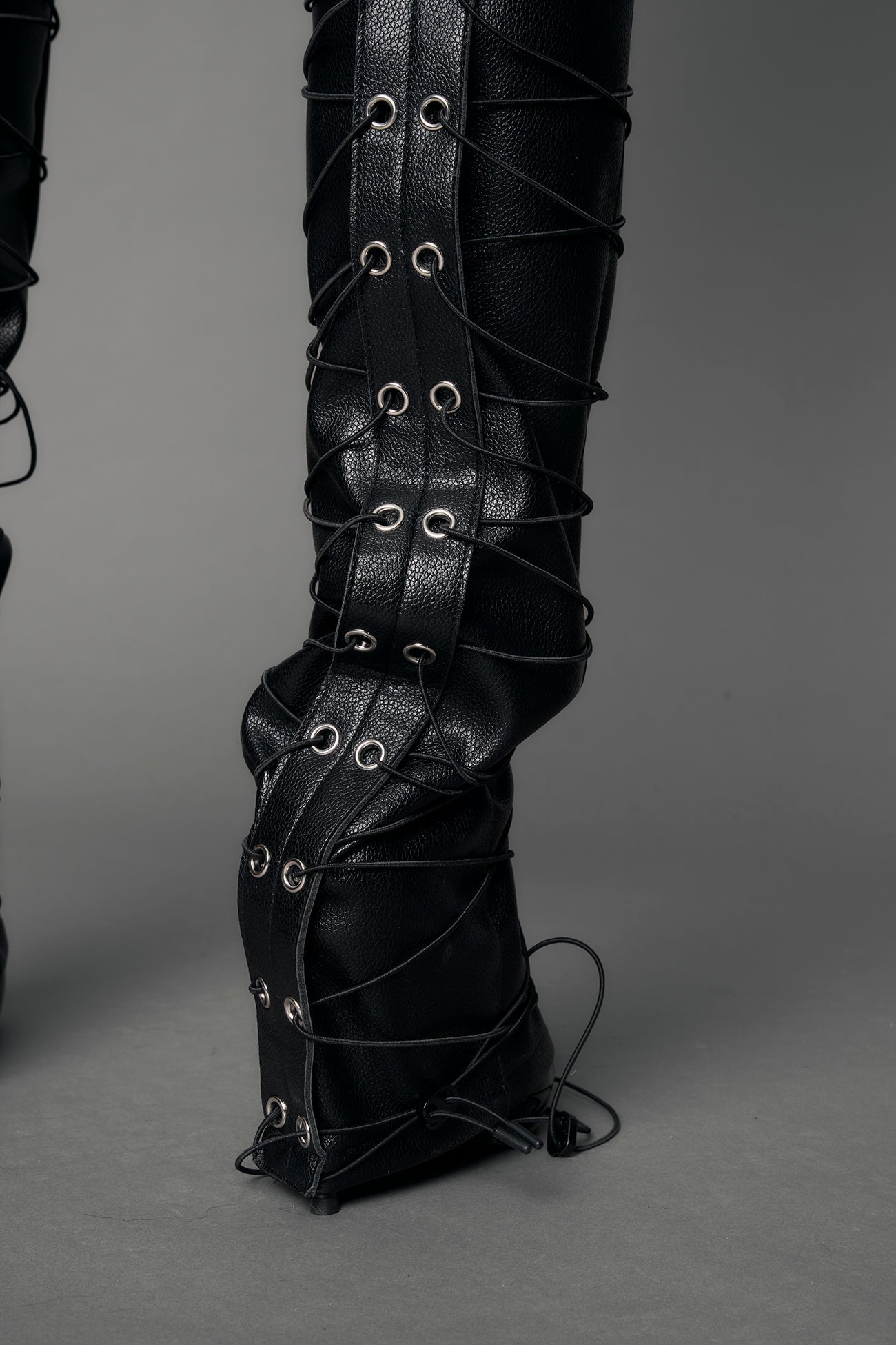 Multi-strap panel detailing down the legs